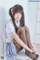 Coser @ 桜 桃 喵 Vol.068: 校服 黑丝 (49 photos) P13 No.33d02b Image No. 73