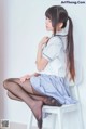 Coser @ 桜 桃 喵 Vol.068: 校服 黑丝 (49 photos) P4 No.71617b Image No. 91